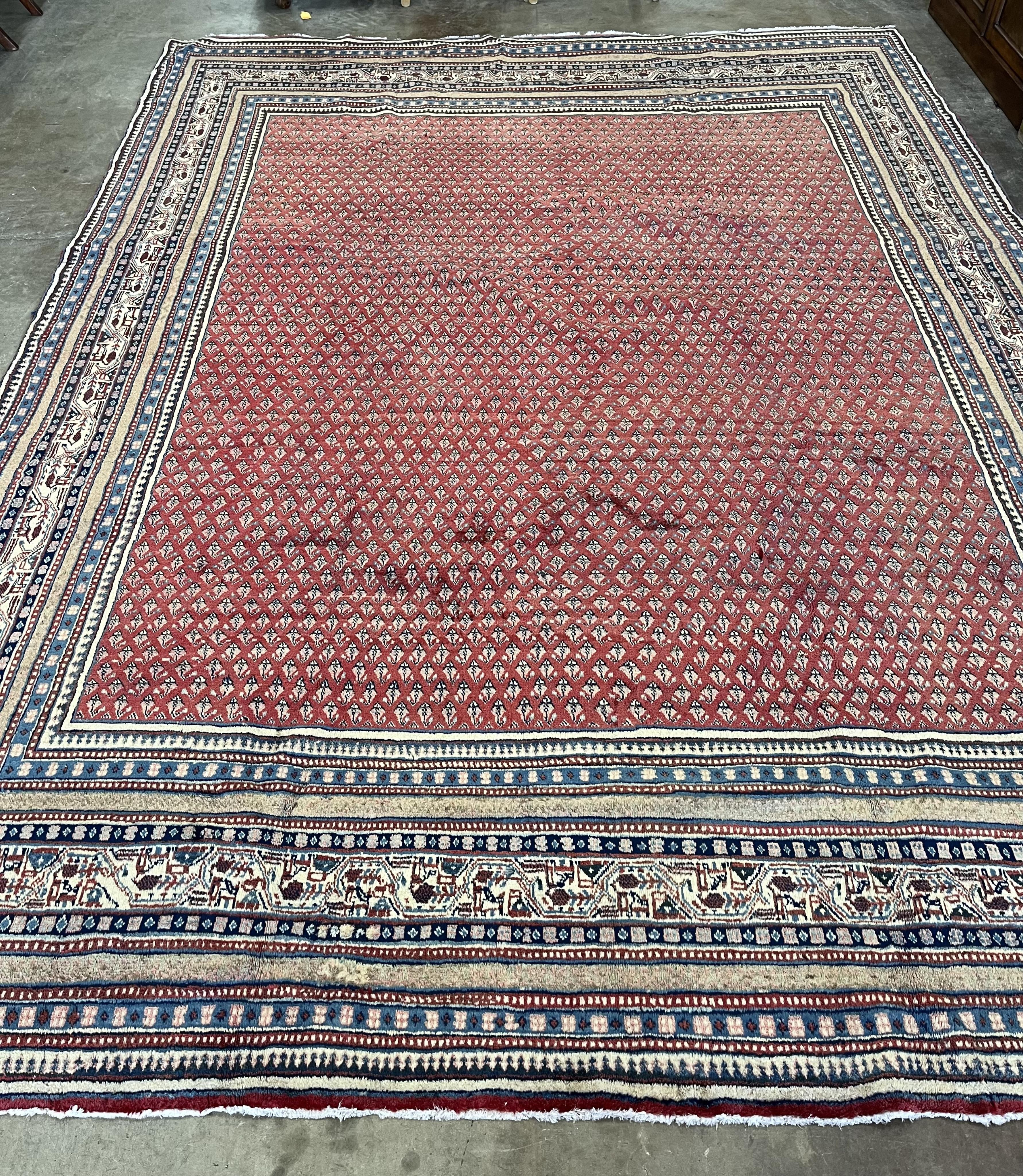 A red ground Araak carpet, 330 x 240